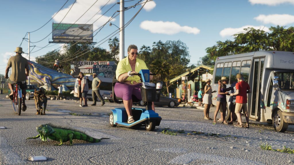 A busy street in the Leonida Keys with a scooter and an iguana on the pavement