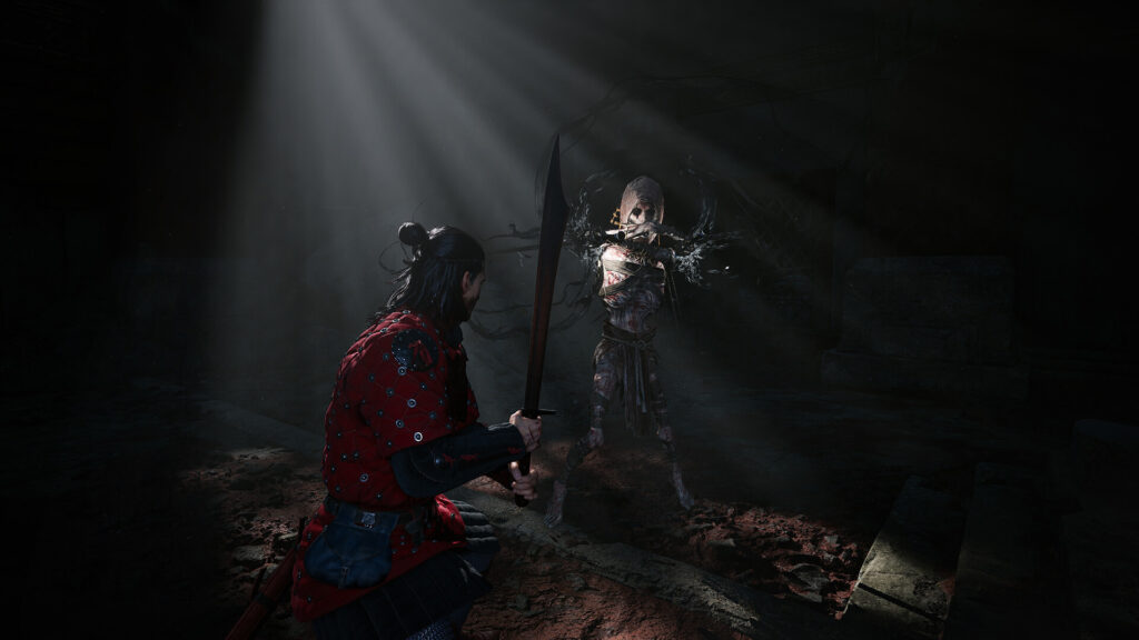 A fight in a dark crypt lit by a shaft of light
