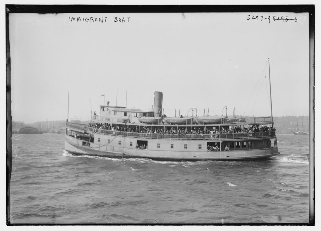 The deck of a ship crowded with European emigrants around 1900