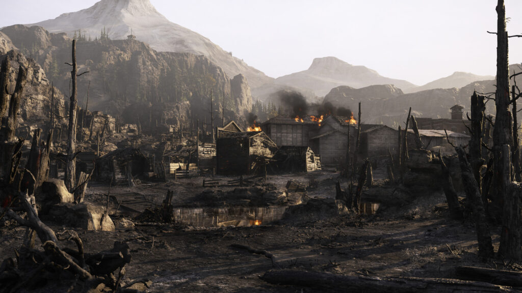 Wide view of a burnt out settlement and mountains in Hunt: Showdown