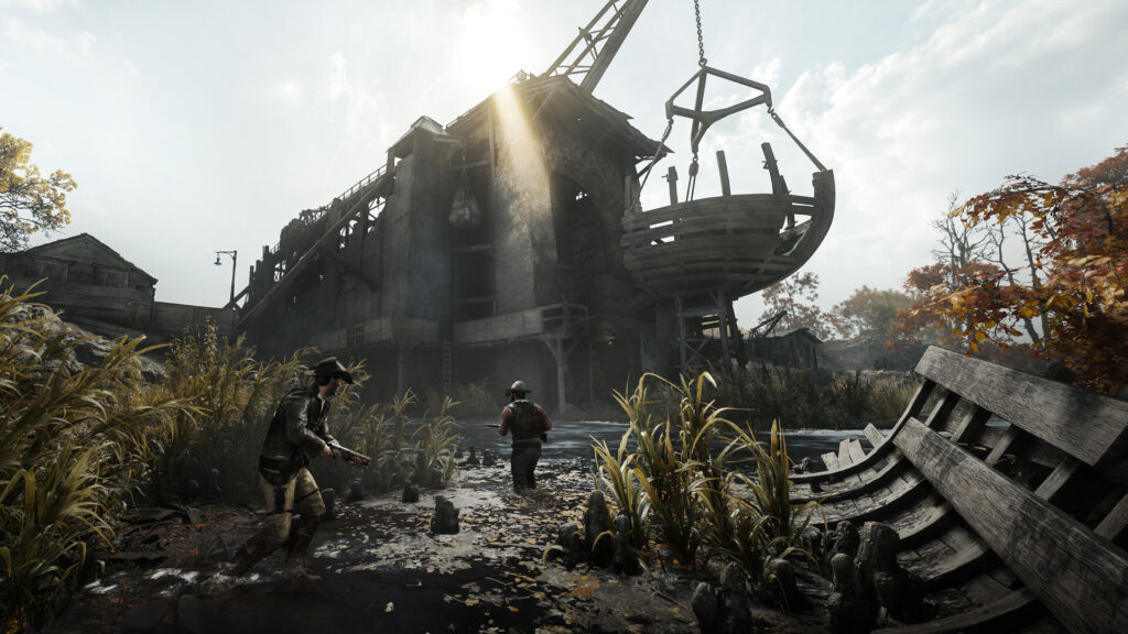Two hunters running through a sunlit industrial compound in Hunt: Showdown