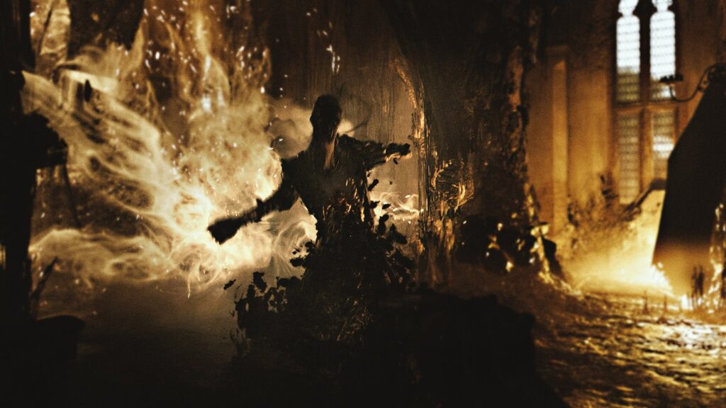 Early build press screenshot of Hunt: Showdown showing a burning enemy in a dark interior