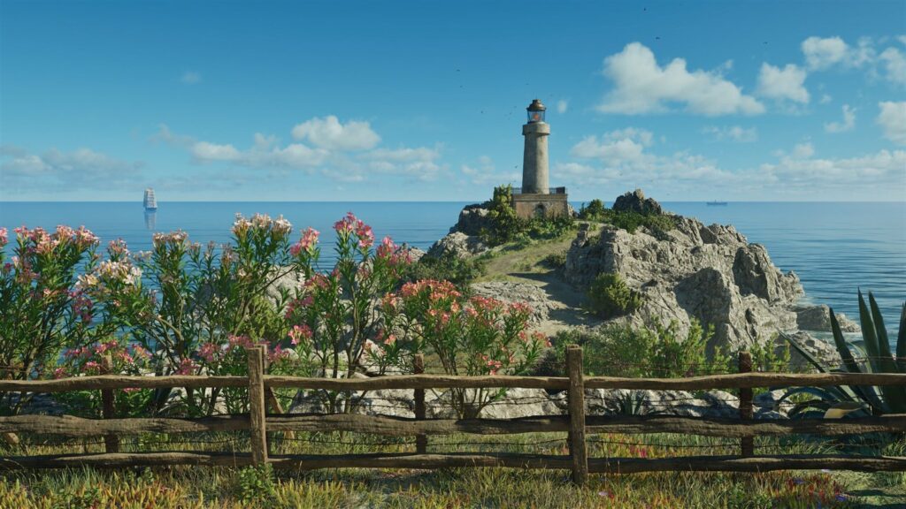 A lighthouse on a rocky headland, blue sea and flowering shrubs in the foreground