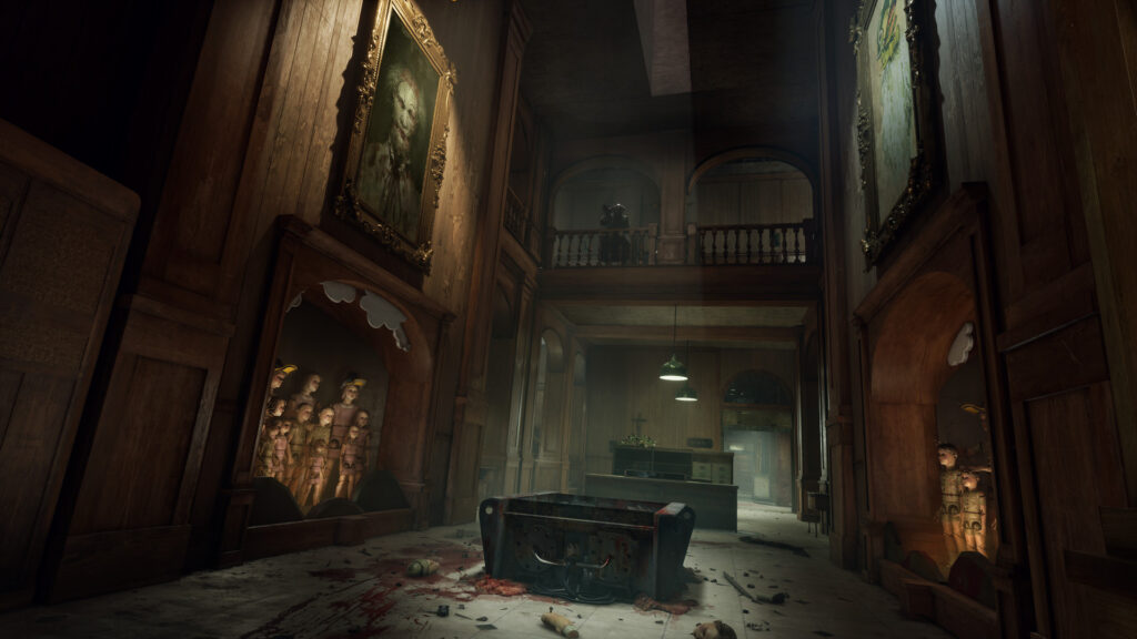 A dark hall with portraits and blood on the floor