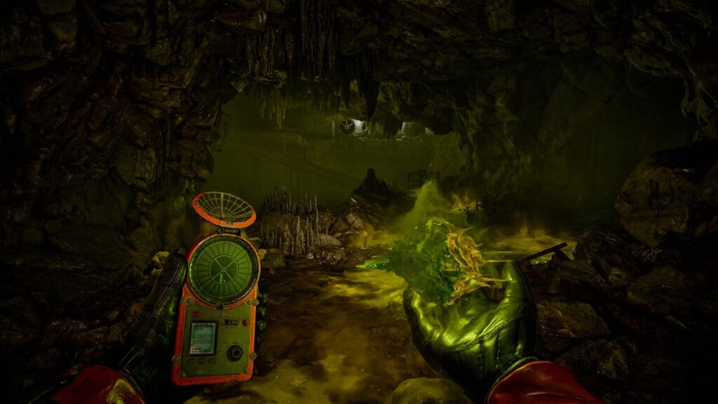 A sickly green anomaly glowing in the dark with a detector in hand