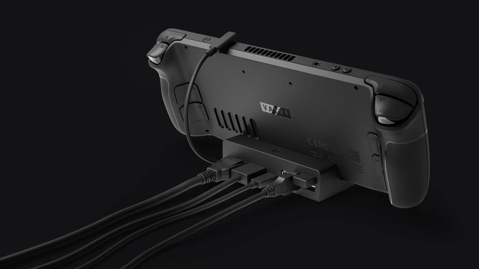 Steam Deck seated in the official docking station with cables attached