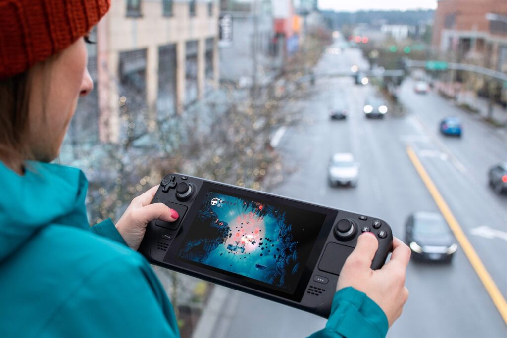 A handheld held in both hands during play