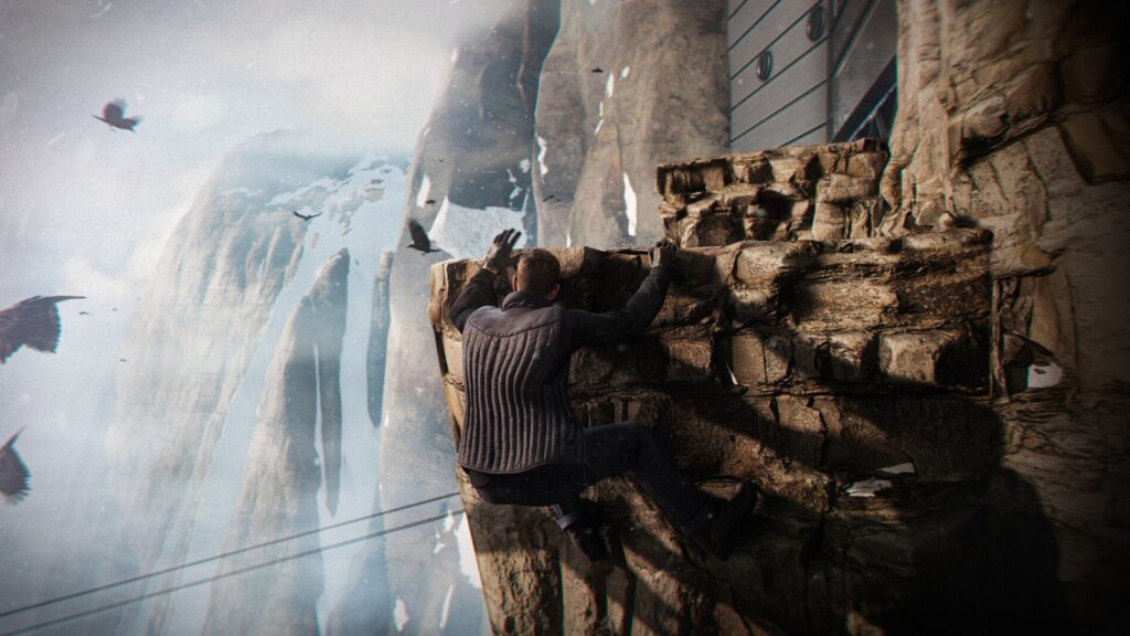 Bond climbing a cliff by a waterfall