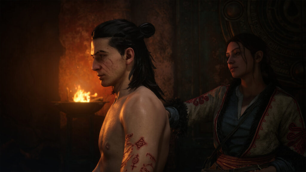 Coen with red hex runes on his arm