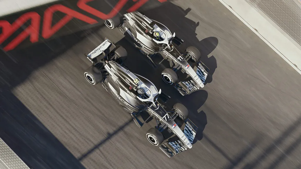 Two F1 25 cars side by side seen from above