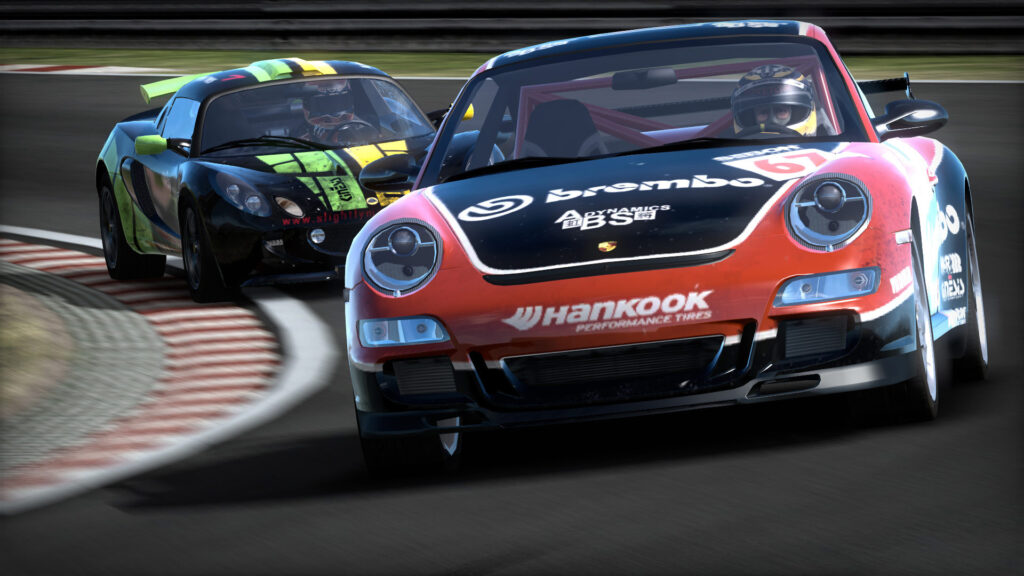 A Porsche and a Lotus racing in Need for Speed: Shift