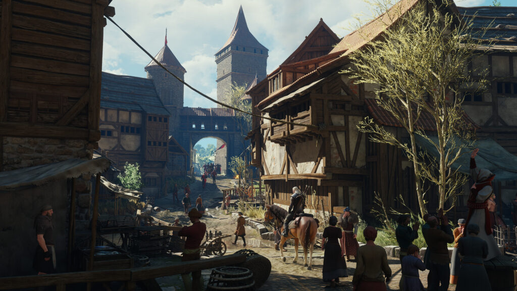 A busy town street with a castle in the background in The Witcher 3