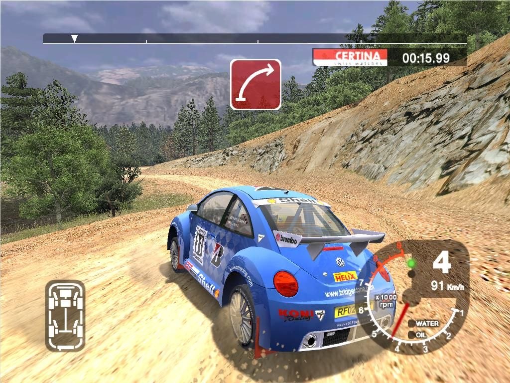A blue Volkswagen Beetle on a dusty mountain stage of the USA rally