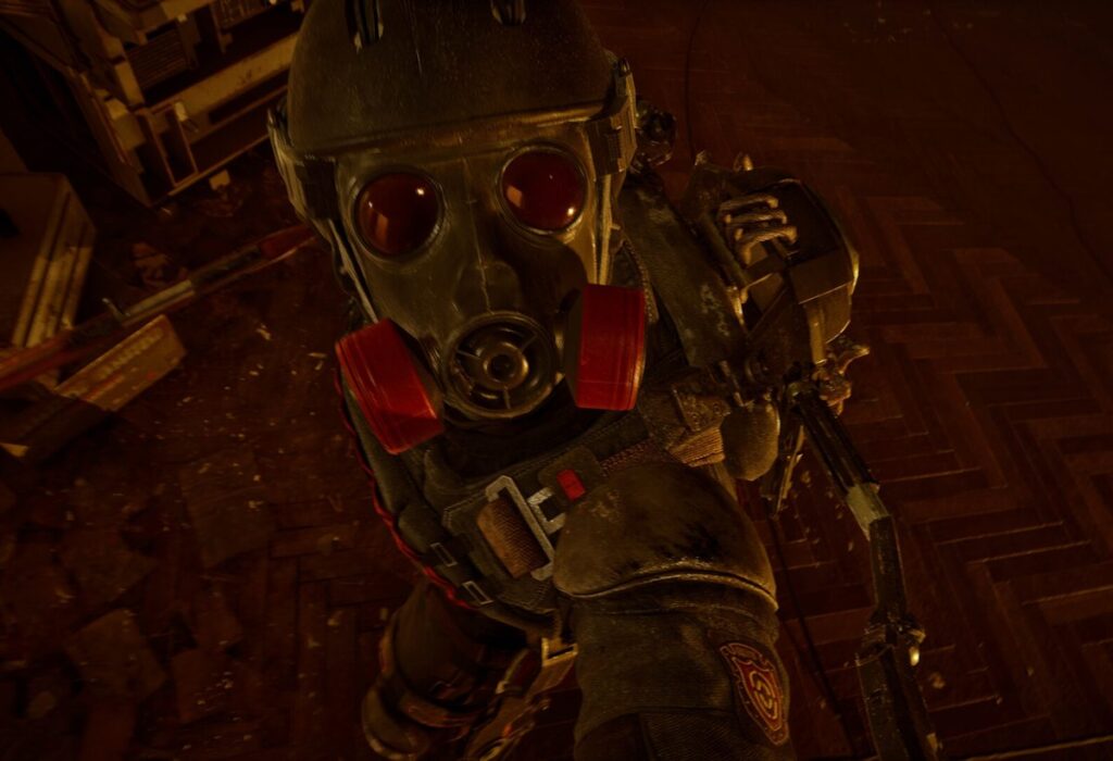 Боец в противогазе в красном свете в S.T.A.L.K.E.R. 2