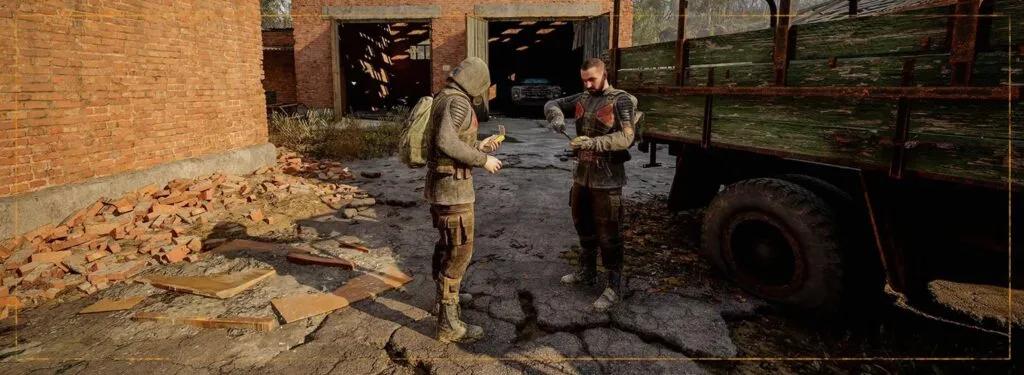 Two stalkers by a truck in S.T.A.L.K.E.R. 2