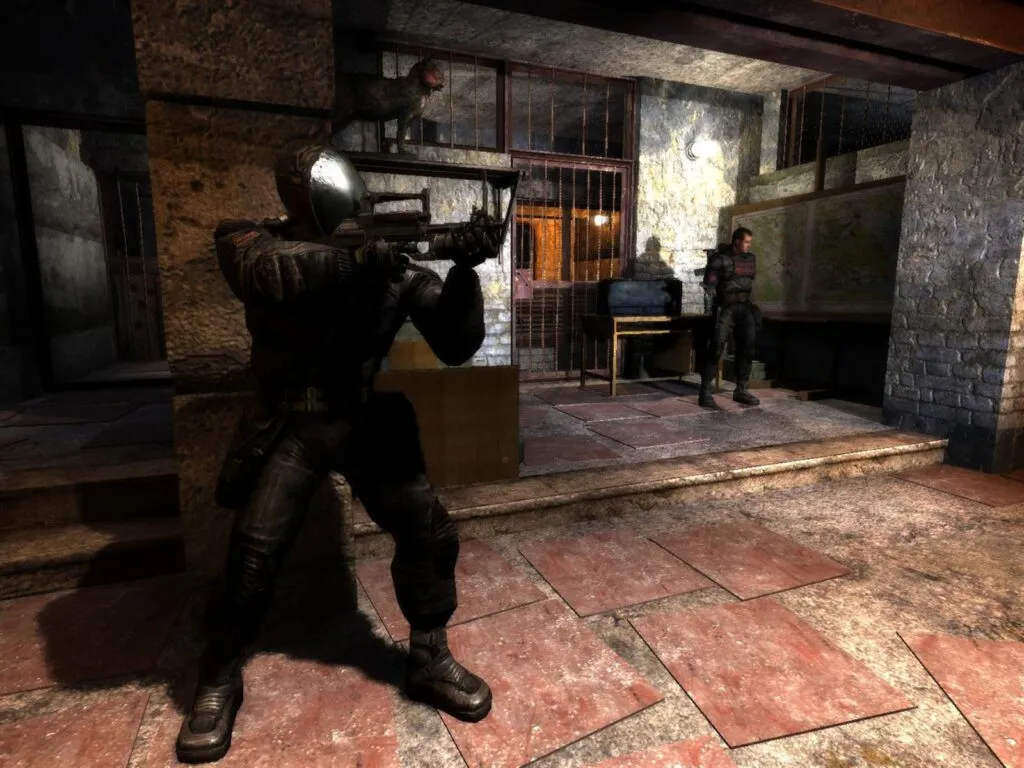 A stalker inside an abandoned building in S.T.A.L.K.E.R.: Shadow of Chernobyl